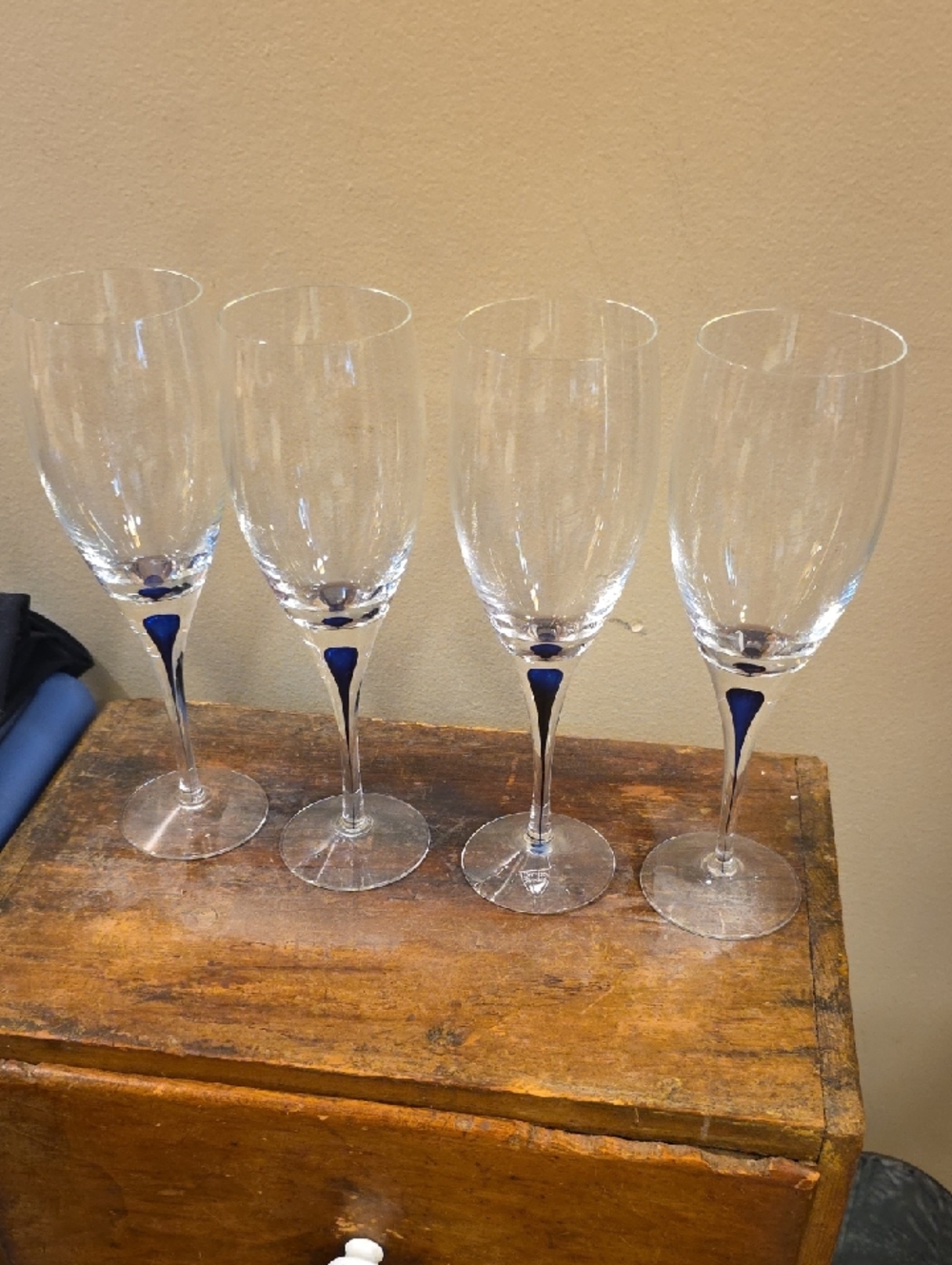 Set of 4 Orrefors Intermezzo blue wine glasses that are nine inches tall